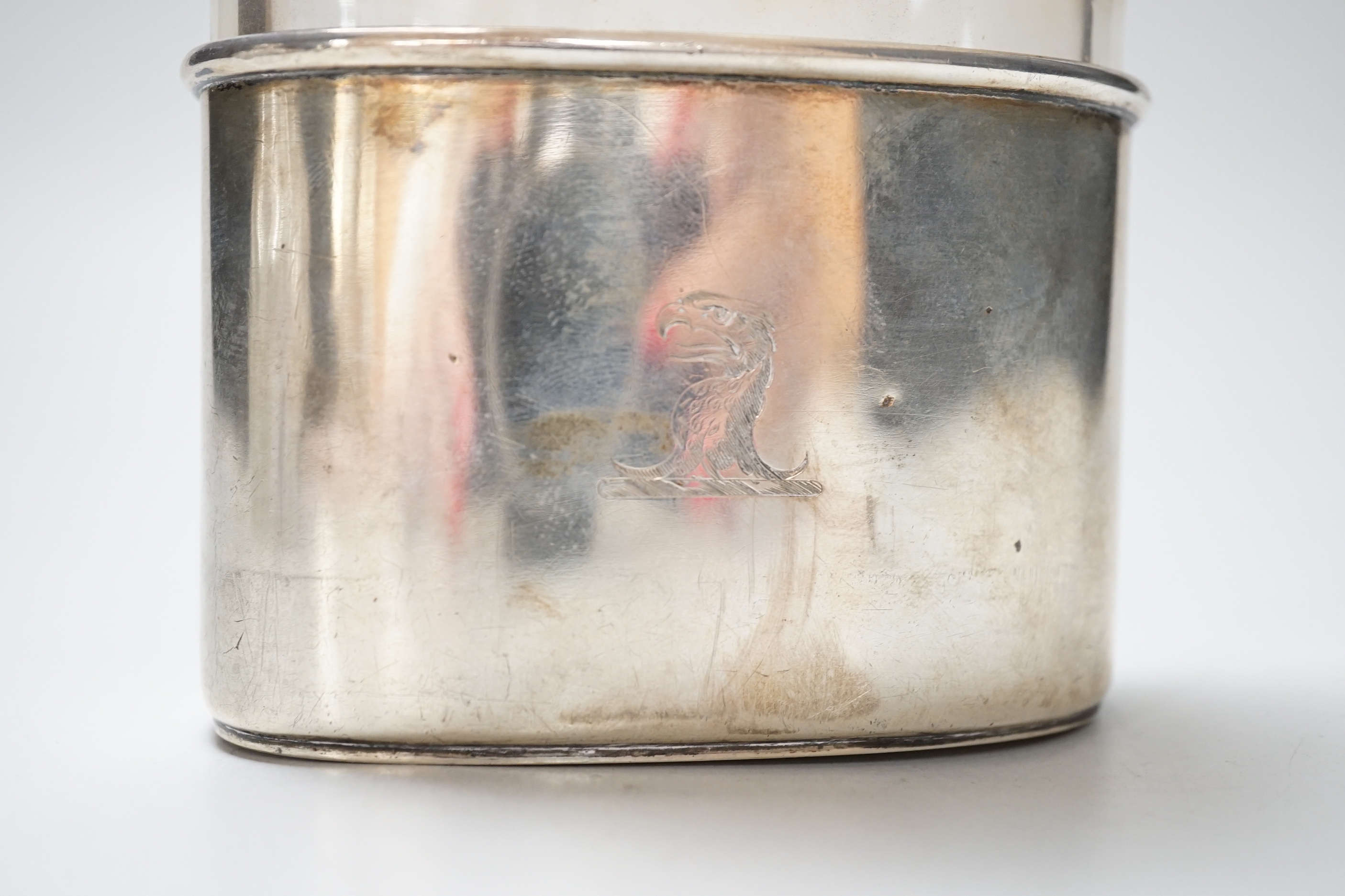 A Victorian silver mounted glass pocket flask, with crested cup base, London 1872, retailed by Asprey & Co., height 17.5cm